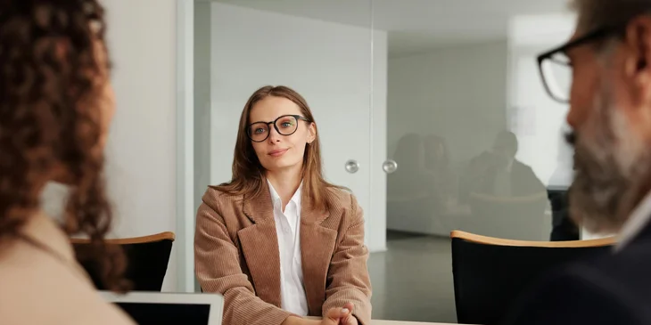 A businesswoman being interviewed.