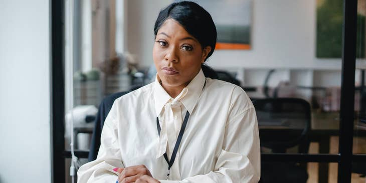 A woman in a white-collar job.
