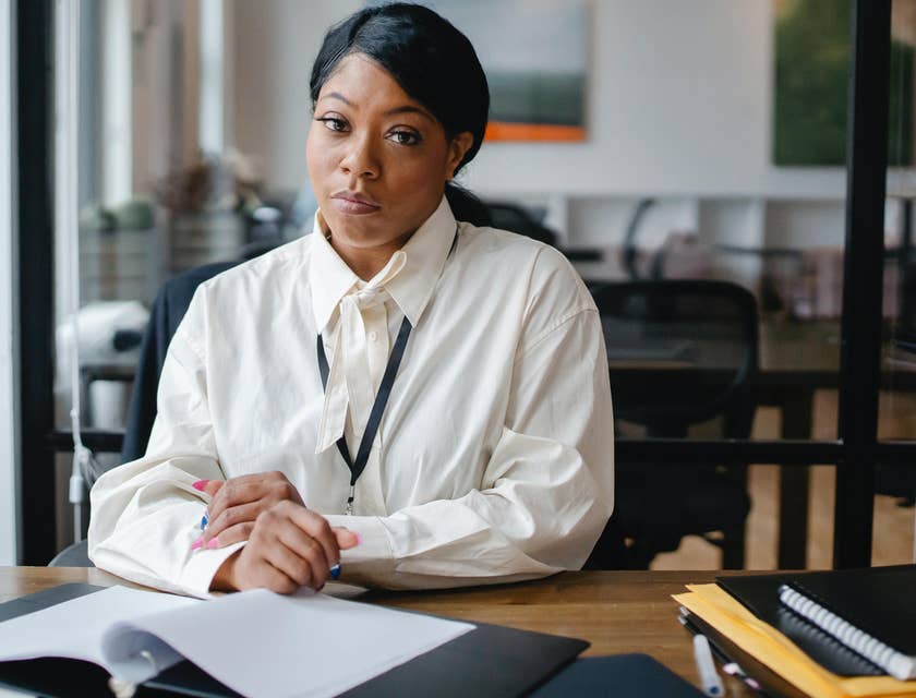A woman in a white-collar job.