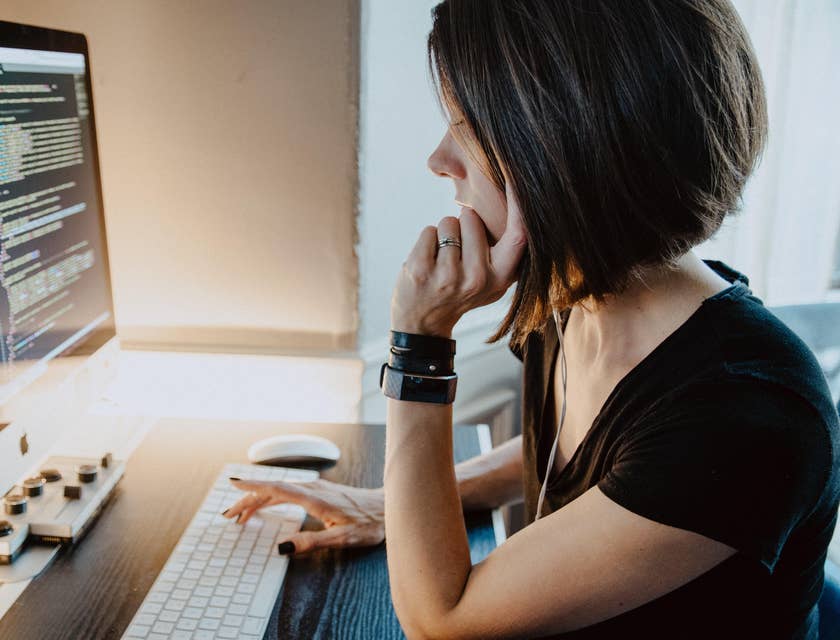 an XML developer debugging her current program before giving it to her client