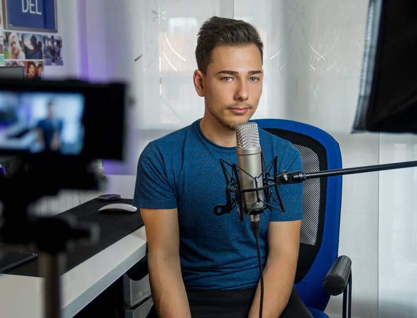 YouTuber recording himself along with his condenser microphone